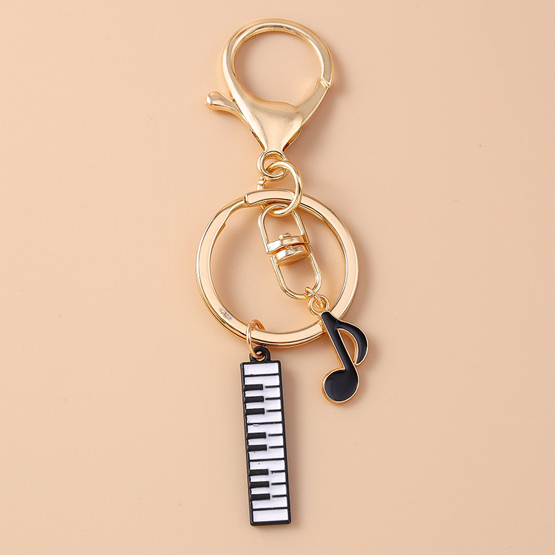 Lucu Enamel Mini Piano gantung - Musical Instrument Tabla ulasan dan harga
